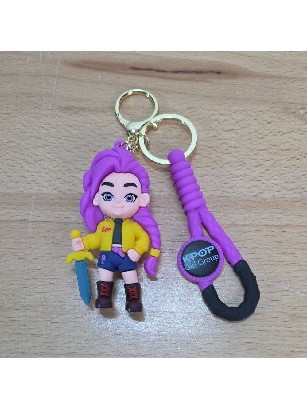 Purple and Yellow Character Keychain with Sword
